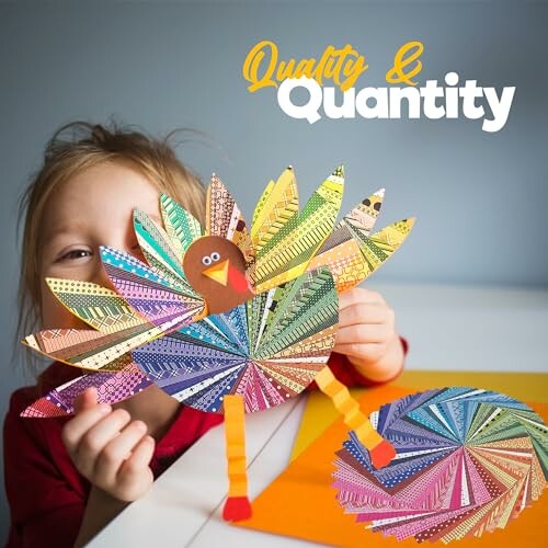 Child holding colorful paper turkey craft.