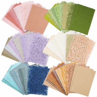 Assorted colorful textured paper sheets in various colors and patterns.