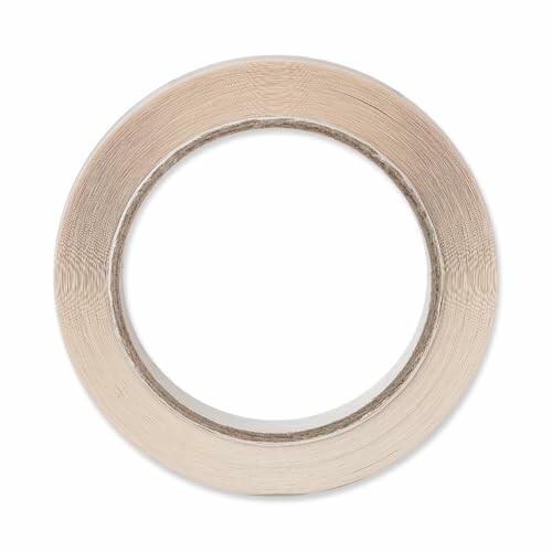 A roll of beige adhesive tape.