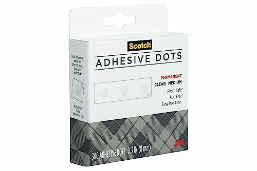 Box of Scotch Adhesive Dots, permanent clear medium, 300 count.